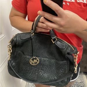 Black leather studded Michael kors bag